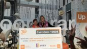 Up SPAIN entrega un Cheque Solidario a AMES